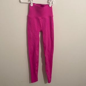 Hot pink Fabletics leggings.